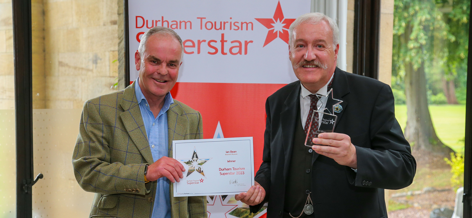 Duncan Peake (Left), Interim Chair of Visit County Durham, with Durham Tourism Superstar 2023 winner Ian Bean, of Beamish, The Living Museum of the North