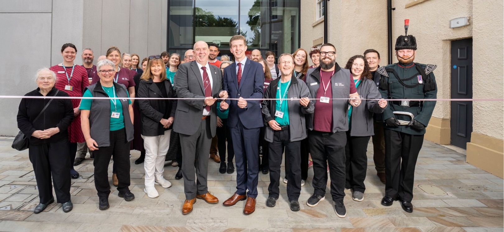 A group of people at the opening of The Story