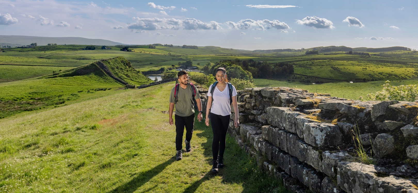 People walking along Hadrian's Wall