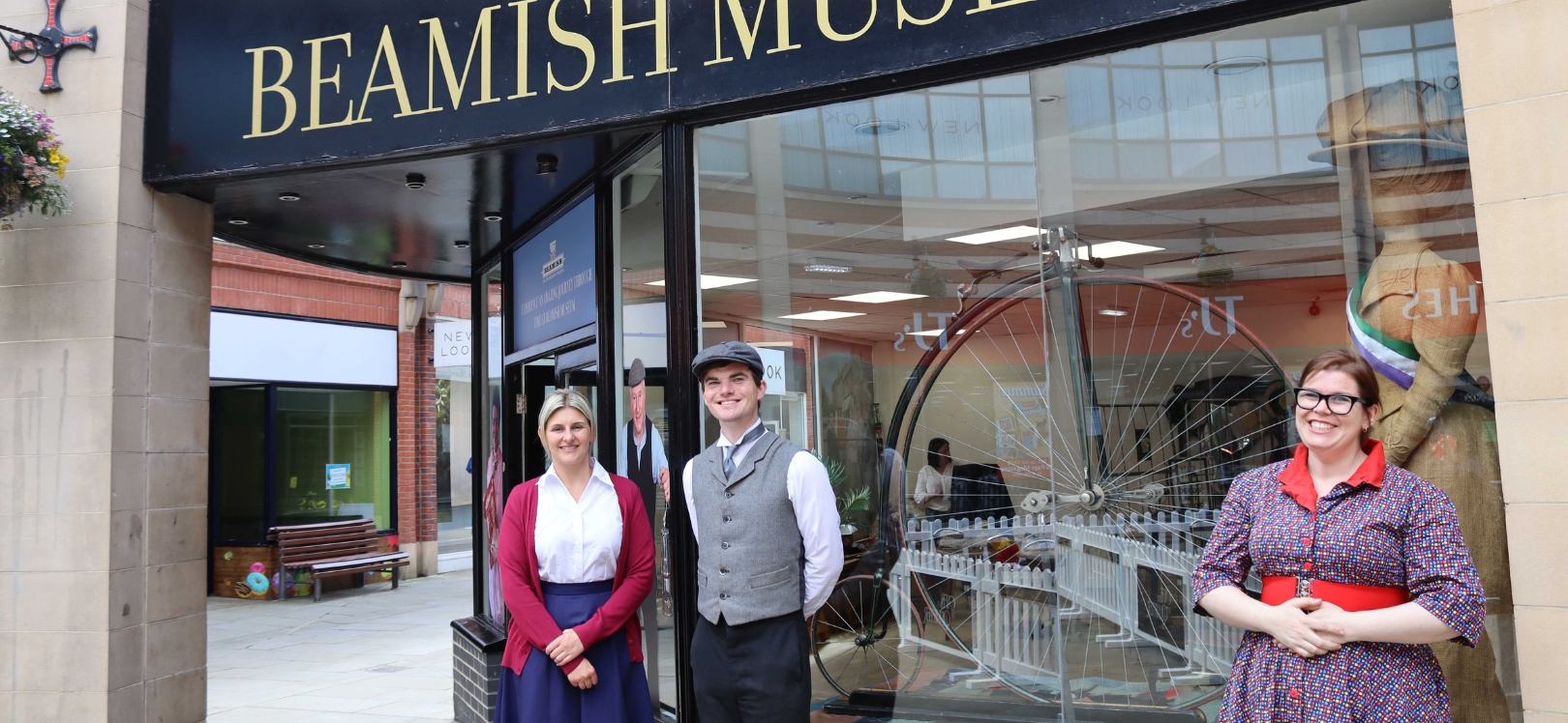 People stood outside of the Beamish shop in Durham City