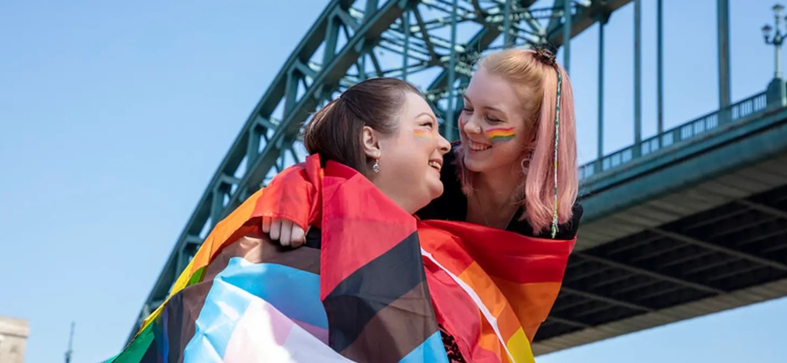 Two women supporting pride in Newcastle