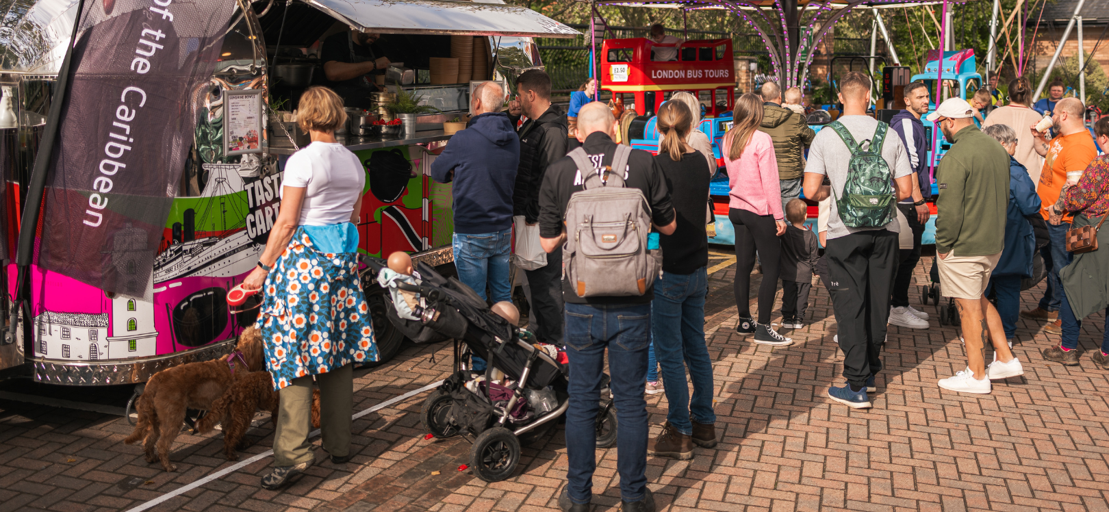 crowd of people browsing stalls and buying food at Chester-Le-EATS food festival