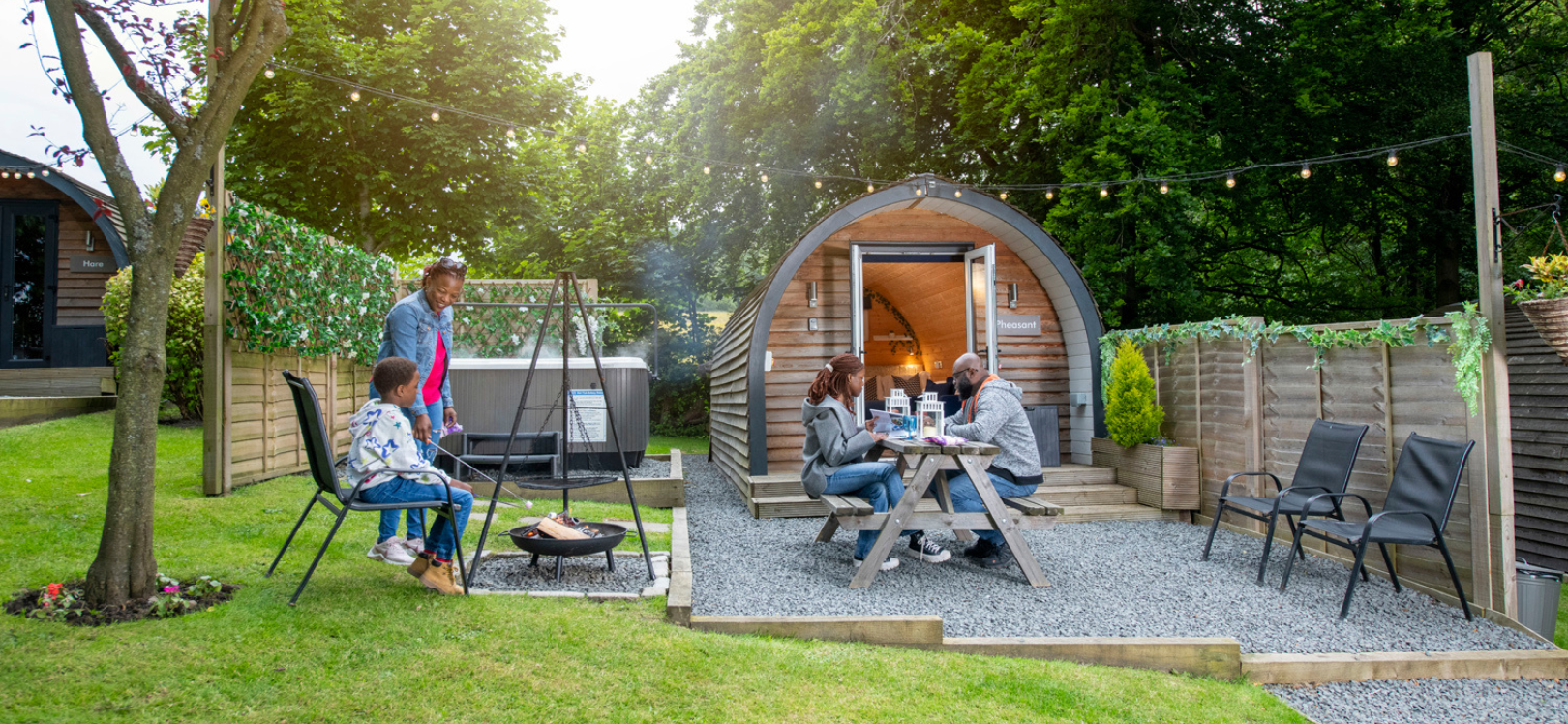 family of four enjoying a glamping break at west hall glamping.