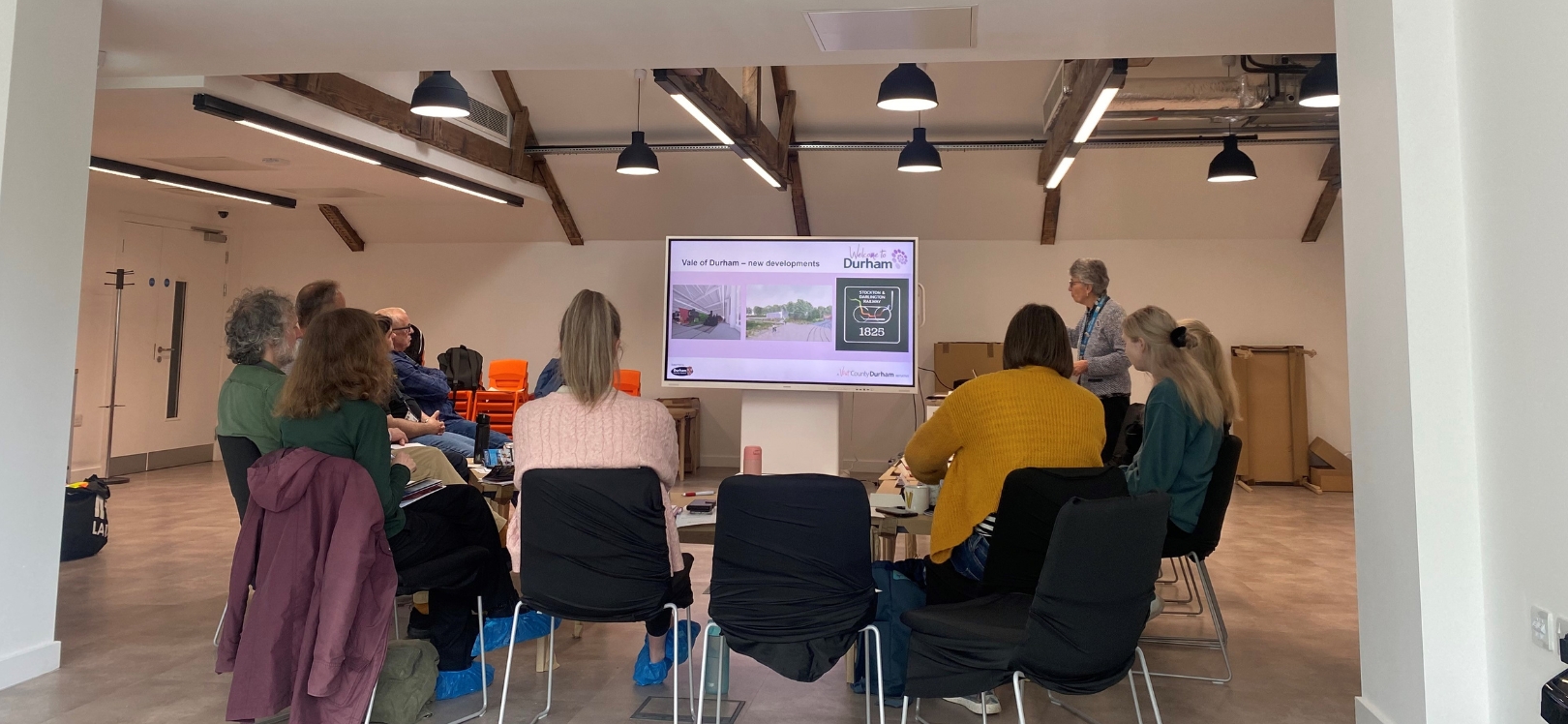 People sat viewing a presentation