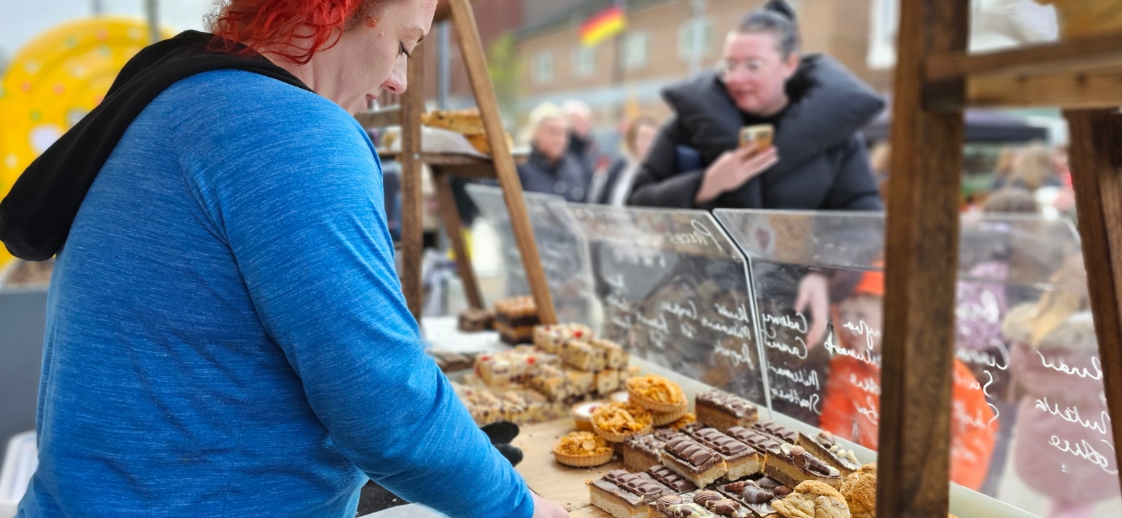 People at a market stall