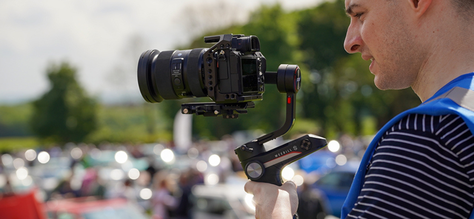 A man holding a camera