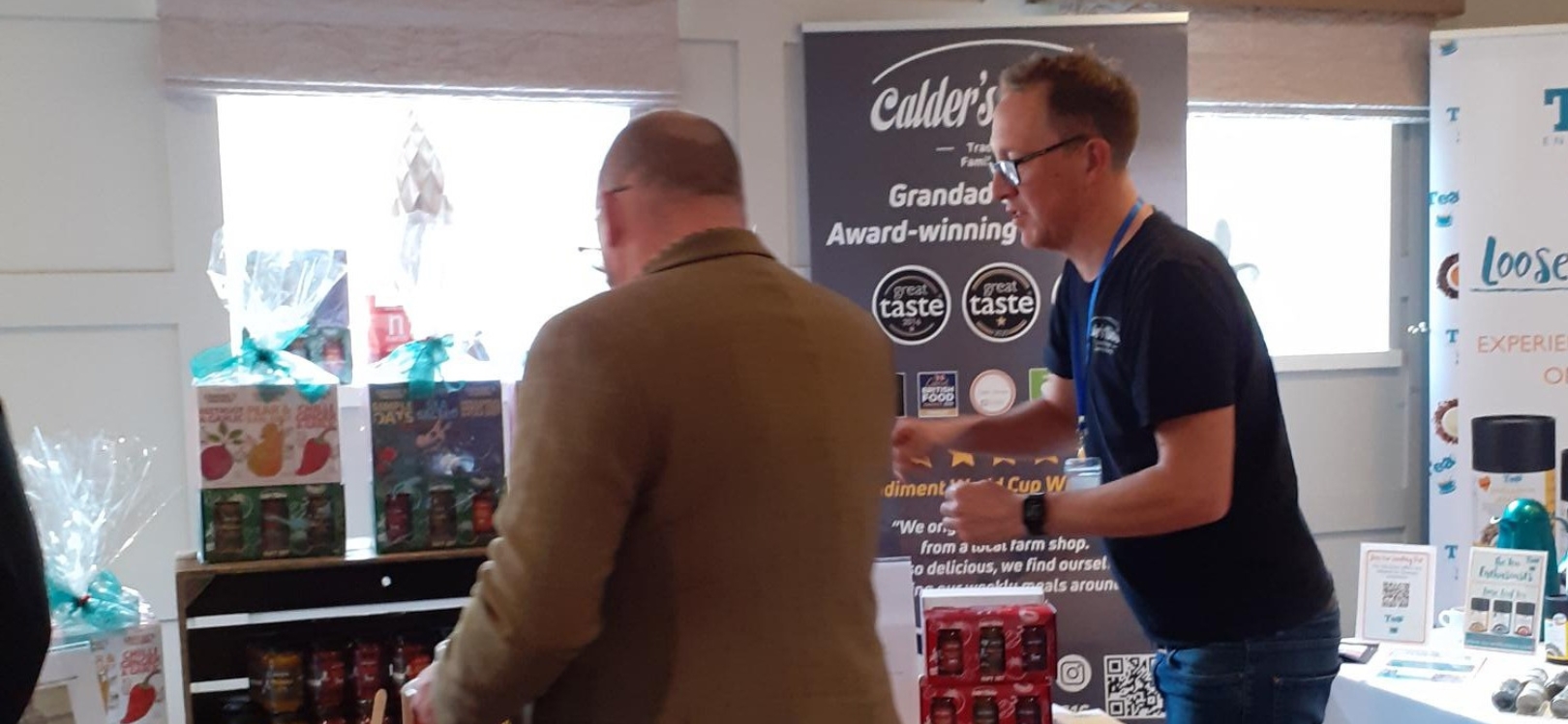 Two men buying and selling preservative at the autumn conference