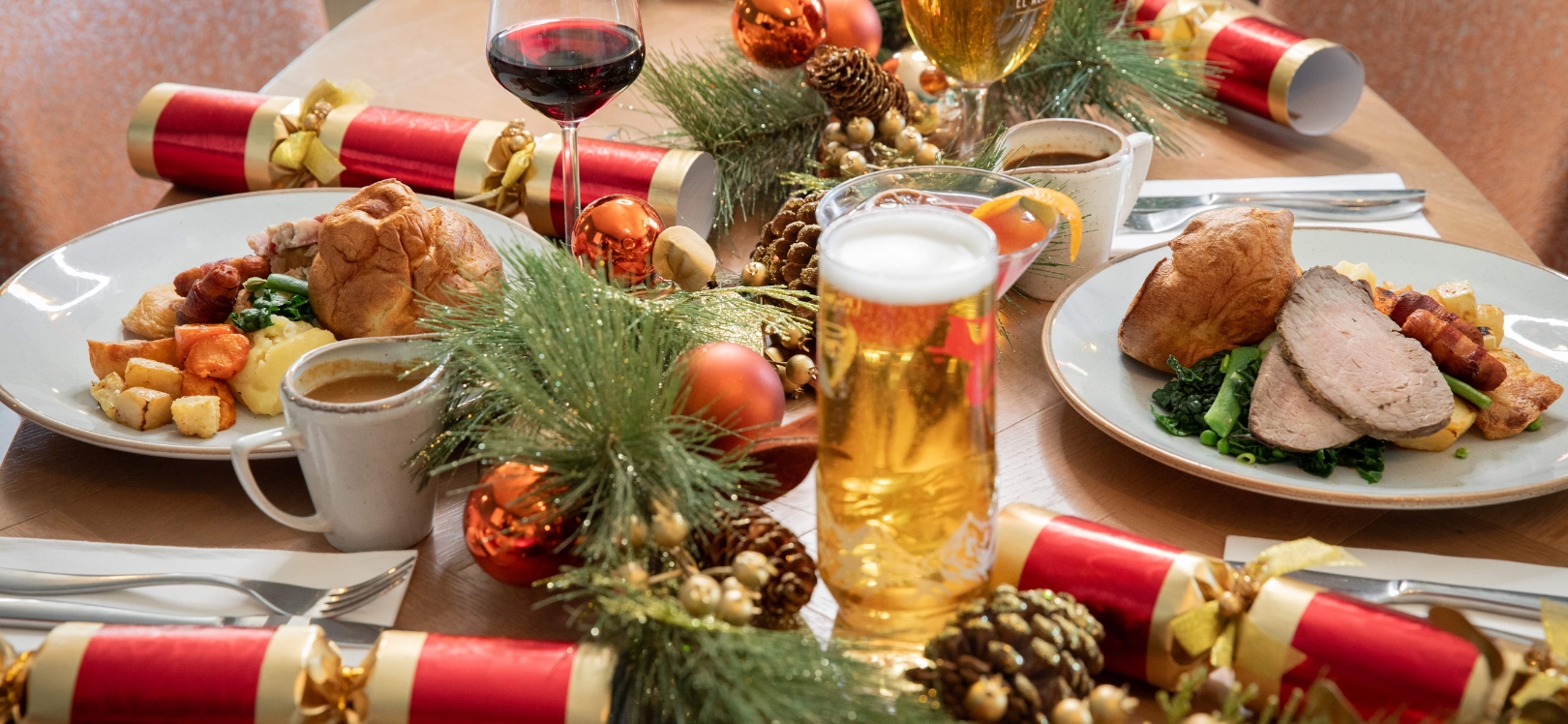 A table with Christmas dinner on it