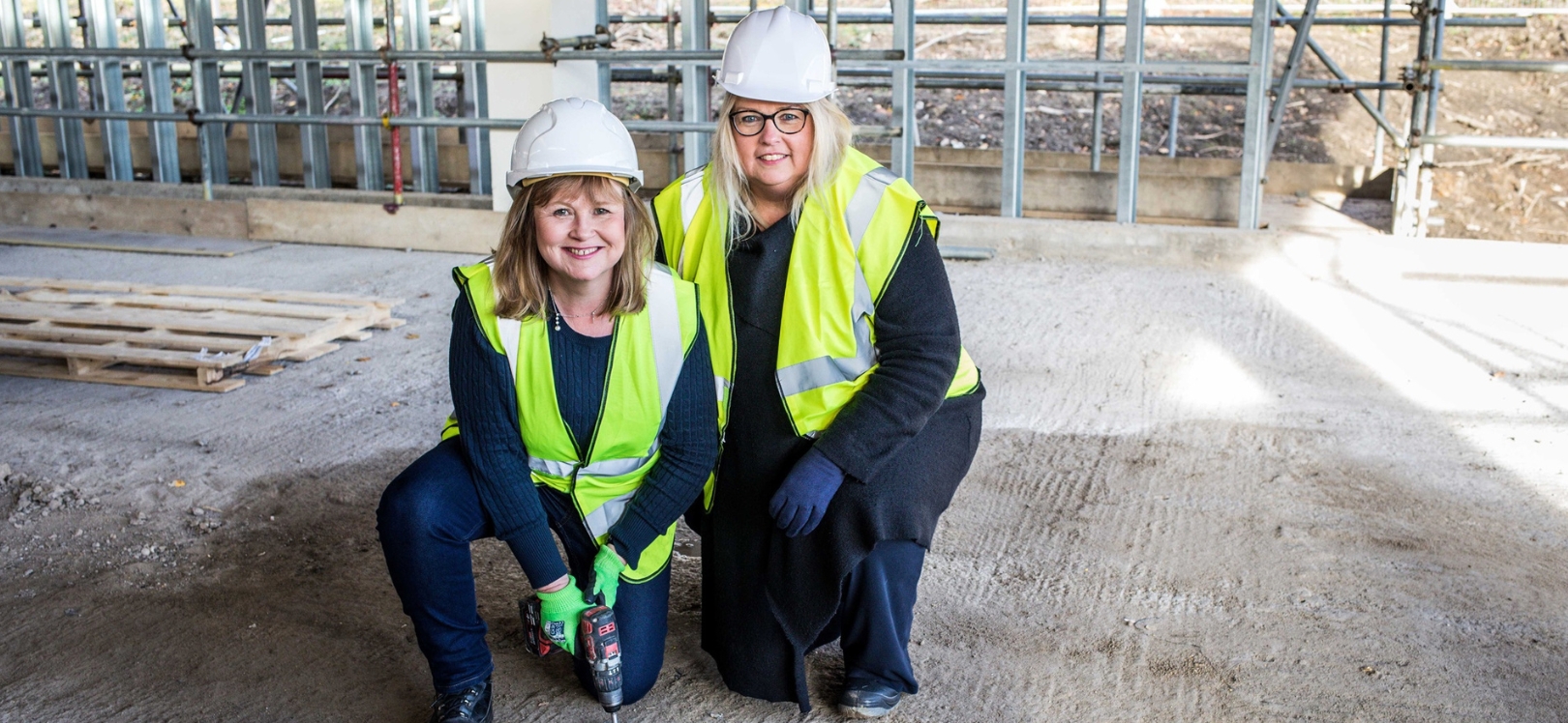 From left, Cllr Elizabeth Scott, Cabinet member for economy and partnerships, and Cllr Amanda Hopgood, Leader of Durham County Council, bolt the embossed steel plate in place.