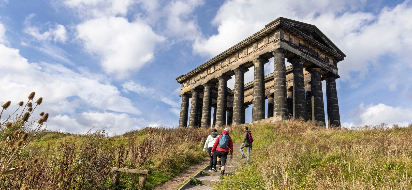 People walking towards Penshaw Monument