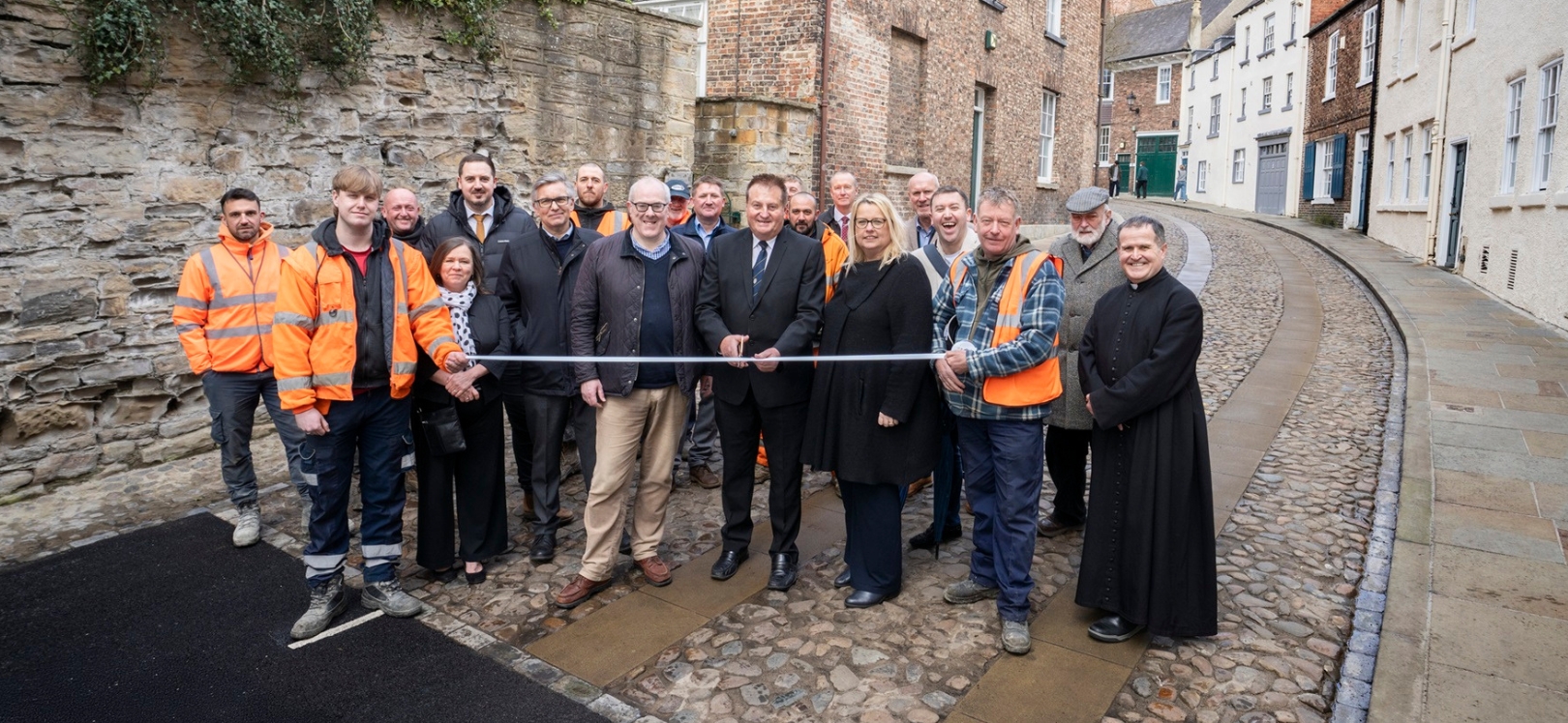 Cllr John Shuttleworth, Durham County Council’s Cabinet member for highways, rural communities and community safety, centre, with Cllr Amanda Hopgood, Leader of Durham County Council, centre right, and representatives from the council, Durham Cathedral and Durham University.